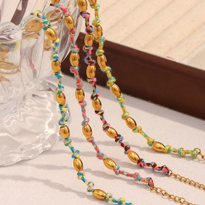 Bracelet perles plaqué or 18K fait main avec des cordes tressées multicolores
