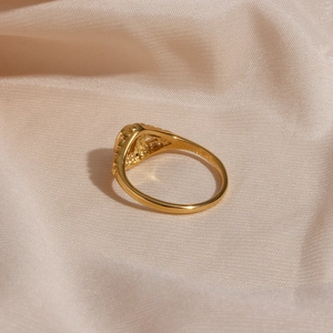 Elegant gold-plated stainless steel flower ring with freshwater pearl on champagne silk
