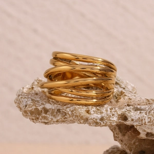 Detail of 18K gold-plated stainless steel ring with chunky multi-layer braided design