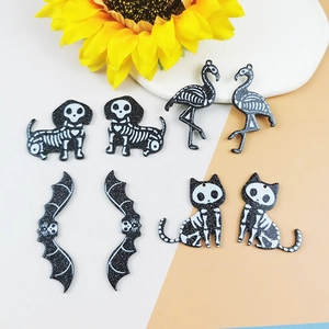 Halloween DIY acrylic skeleton charms featuring dog flamingo bat and cat pendants