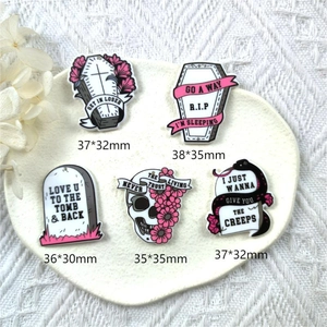 Acrylic Halloween charms set featuring gothic skull and tombstone shapes for DIY jewelry