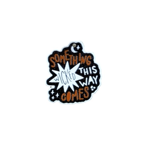 Ghostly Halloween embroidery patch featuring 'Something Wicked This Way Comes' text