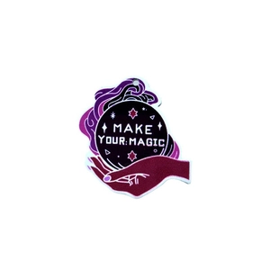 Halloween acrylic magic crystal ball charm with Make Your Magic slogan in black and purple