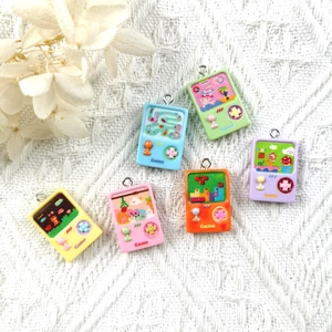 Set of six colorful resin vintage handheld game console pendants with silver metal hooks