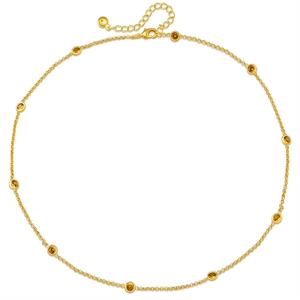Detail of adjustable 18K gold plated brass necklace featuring eleven yellow zircon stones