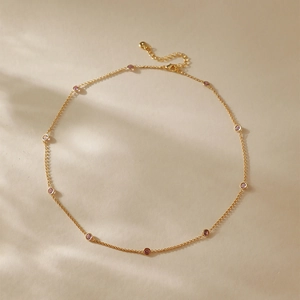 Elegant gold-tone stainless steel necklace with pink zircon beads and adjustable chain