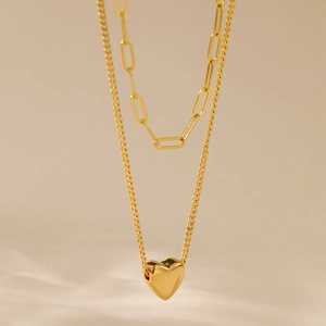 18K gold plated brass layered necklace featuring a paperclip chain and heart pendant