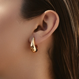 Modern gold-plated teardrop earrings with a high-polished metallic finish for women