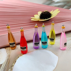 Set of 6 colorful resin mini wine bottle pendants with metal loops for DIY crafts