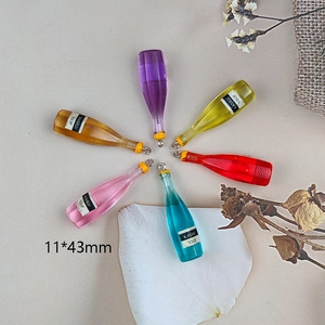 Set of 6 colorful resin mini wine bottle pendants with metal loops for DIY crafts