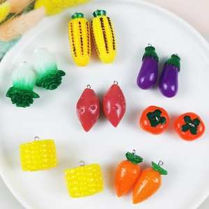 Cute resin vegetable charms for DIY crafts featuring corn, cabbage, and eggplant shapes