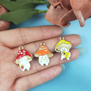 Handcrafted cartoon mushroom enamel pendants with strawberry and guitar designs