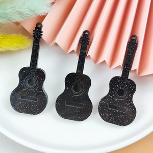 Three black glitter acrylic electric guitar pendants for DIY jewelry making and crafts