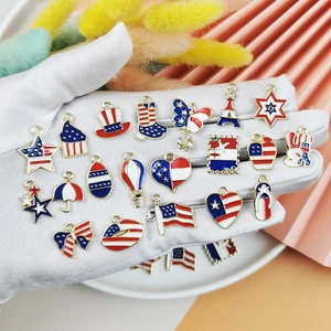 USA flag themed alloy charms set with red white and blue enamel and gold plating