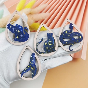 Starry sky wooden animal pendants featuring swan, cat, snake and whale for DIY jewelry
