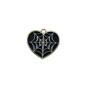 Gothic heart-shaped spider web charm with black enamel and gold metallic lines