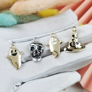 Halloween charm set with gold ghost, silver skull, and witch hat for DIY jewelry making