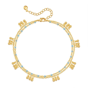 Cavigliera doppia fila minimalista dorata per donna con perline blu e ciondoli a sfera