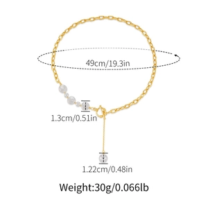 Detail view of gold toggle clasp necklace with white pearls and 49cm length dimensions