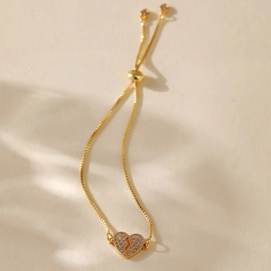 18K gold-plated thin bracelet with a heart pendant featuring a unique lightning bolt crack