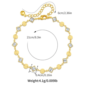 Detalle de tobillera de cristal dorado con longitud de 21 cm y cadena ajustable de 6 cm