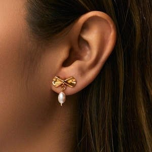 Elegant 18K gold plated bow earrings featuring white teardrop pearl drops for women