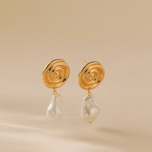 Elegant 18K gold plated conch style earrings with baroque freshwater pearls on beige background