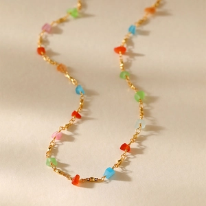 Colorful crystal beaded necklace with gold plated chain in a vibrant ethnic style design