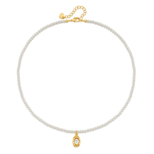 Franse retro parelketting met gouden hanger en hartvormig detail