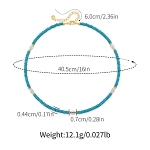 Detail showing 40.5cm turquoise bead necklace dimensions with 6cm gold extension chain