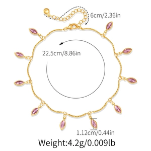 Detail view of gold anklet with pink zircon charms and dimensions labeling
