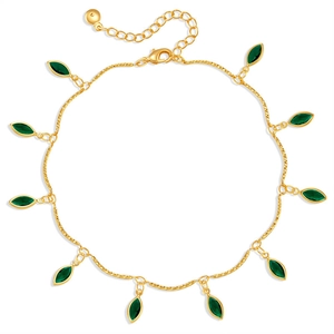 Detail of 18K gold plated anklet featuring eleven green marquise-cut gemstone charms