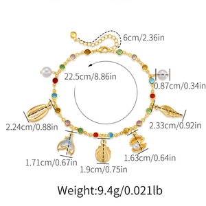 Detail of 18K gold plated anklet with colorful ocean charms like sea shells and pearls