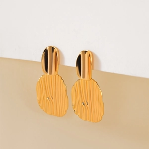 Elegant gold metal textured drop earrings with modern crumpled lava aesthetic design