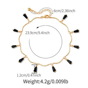 Elegant gold plated anklet featuring black geometric glass pendants and adjustable chain