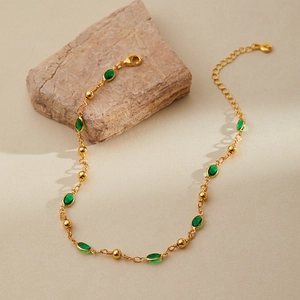 Bohemian gold chain anklet with green oval stones and 18K gold plated finish