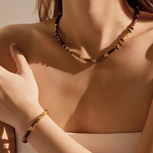 Ensemble collier et bracelet faits main en œil de tigre avec perles spirales dorées