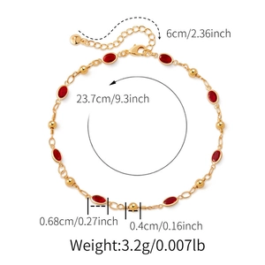 Detail showing 23.7cm length gold anklet with red oval stones and lobster clasp