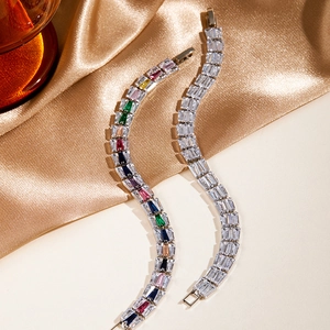 Detail of tennis bracelets with rectangular zircon in rainbow and clear white colors