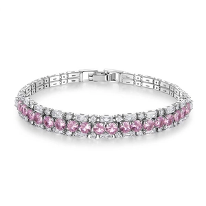 Detail of three-row tennis bracelet with pink round stones and white baguette zircons