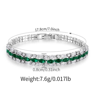 Detailed view of silver flower bracelet with green emerald gems and dimensions