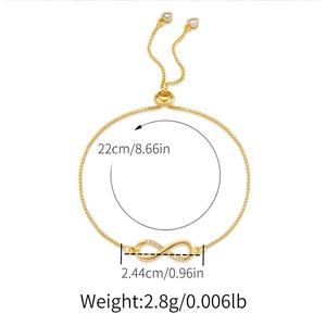 Detail view of gold infinity bracelet with adjustable slider and measurement dimensions