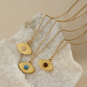 Collana vintage malocchio con turchese e pietra occhio di tigre finitura oro