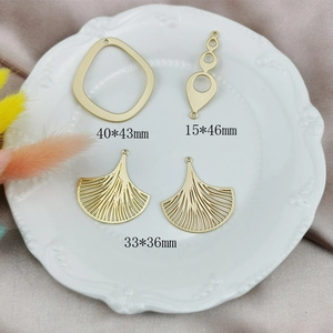 Golden alloy geometric hollow charms for DIY jewelry making in various artistic shapes
