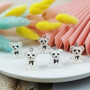 Glinsterende transparante hars beer bedeltjes met zwarte strikjes voor DIY sieraden maken