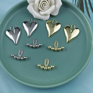Pendentifs cœur en or et argent polis avec vestes de boucles d'oreilles pour bijoux DIY