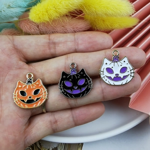 Three colorful Halloween cat-themed pumpkin enamel alloy charms for DIY jewelry making