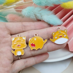 Three cute yellow cartoon tiger enamel pendants for DIY jewelry and keychains