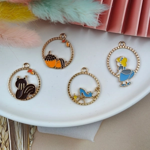Golden hollow enamel charms set featuring squirrel and fairy tale glass slippers