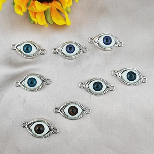 Antique silver evil eye charm connectors with blue and brown pupils for DIY jewelry